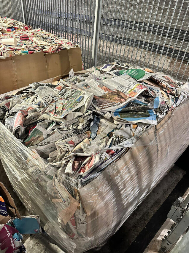 A bundle of newspaper waste in a depot at Euston rail station