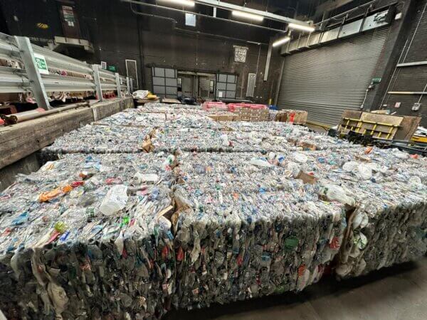 Bundles of plastic waste in a depot at Euston rail station