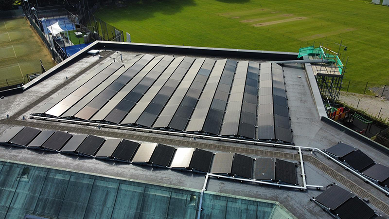 Solar panels on the roof of a David Lloyd leisure centre